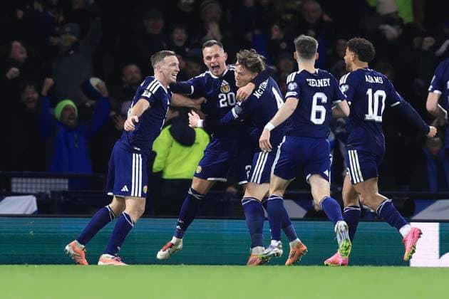 18th November 2025; Hampden Park, Glasgow, Scotland; FIFA World Cup, WM, Weltmeisterschaft, Fussball Qualifiers International Football, Scotland versus Denmark; Lawrence Shankland of Scotland is congratulated after scoring for 2-1 in the 78th minute by Lewis Ferguson and Scott McTominay  DavidxYoung