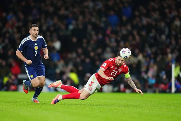 November 18 2025: Pierre-Emile HoÂ¸jbjerg of Denmark on the ground during a World Cup Qualification game, Scotland v Denmark , Hamden , Glasgow, Scotland. CSM Glasgow Scotland - ZUMAc04_ 20251118_zma_c04_081 Copyright: xKimxPricex