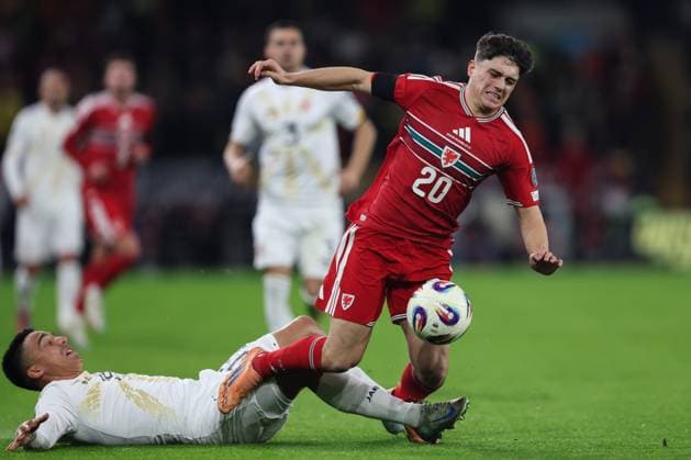 Cardiff, Wales, 18th November 2025. Dan James of Wales is fouled by Tihomir Kostadinov of North Macedonia during the Wales vs North Macedonia UEFA European Championship, EM, Europameisterschaft Qualifying match at the Cardiff City Stadium, Cardiff. Picture credit should read: Gareth Evans Sportimage EDITORIAL USE ONLY. No use with unauthorised audio, video, data, fixture lists, club league logos or live services. Online in-match use limited to 120 images, no video emulation. No use in betting, games or single club league player publications. SPI_093_GE_WAL_MKD SPI-4291-0095