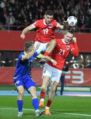 (251119) -- VIENNA, Nov. 19, 2025 -- Christoph Baumgartner (C) and Patrick Wimmer (R) of Austria compete during the 2026 World Cup European Qualifiers match between Austria VS Bosnia and Herzegovina in Vienna, Austria, Nov. 18, 2025. ) (SP)AUSTRIA-VIENNA-FOOTBALL-2026 WORLD CUP EUROPEAN QUALIFIERS-AUSTRIA VS BOSNIA AND HERZEGOVINA HexCanling 