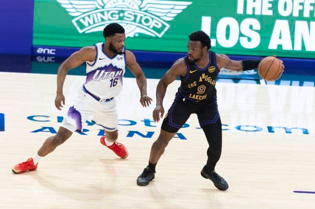 November 18, 2025, Los Angeles, California, United States: Los Angeles Lakers™ Bronny James (9) is defended by Utah Jazz s Elijah Harkless (16) during an NBA, Basketball Herren, USA basketball game, at Crypto.com Arena. Lakers 140:126 Jazz. Los Angeles United States - ZUMAs197 20251118_aaa_s197_547 Copyright: xRingoxChiux