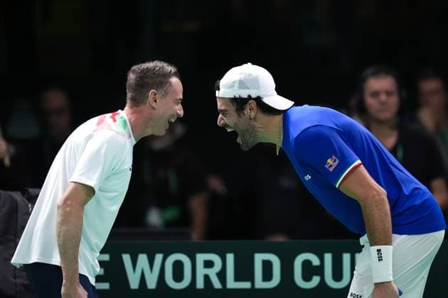 Matteo Berrettini celebrates for the victory with captain Filippo Volandri during the Davis Cup Finals 2025 Quarterfinals match between Matteo Berrettini (Italy) and Jurij Rodionov (Austria) at Bologna Fiere, Bologna, Italy - November 19, 2025. - Tennis.  Copyright: xMassimoxPaolone LaPressex