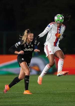 Biella, Italy, 19th November 2025. Tarciane of OL Lyonnes heads clear from Michela Cambiaghi of Juventus during the Juventus Women vs Lyonnes UEFA Womens Champions League match at Stadio Vittorio Pozzo, Biella. Picture credit should read: Jonathan Moscrop Sportimage EDITORIAL USE ONLY. No use with unauthorised audio, video, data, fixture lists, club league logos or live services. Online in-match use limited to 120 images, no video emulation. No use in betting, games or single club league player publications. SPI_011_JM_JUVE_LYONNES_UWCL SPI-4295-0011