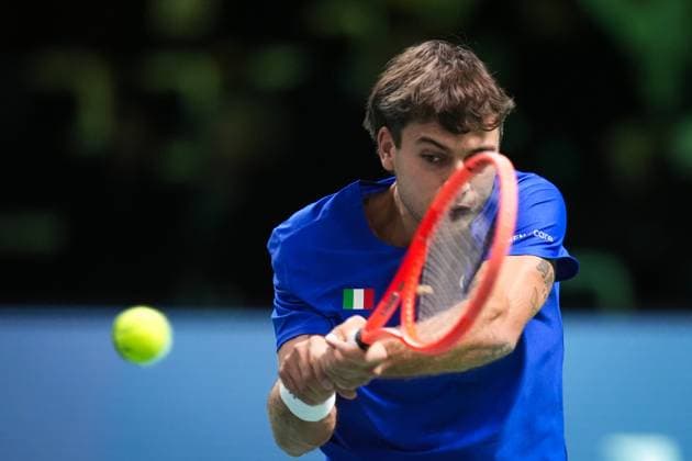 Flavio Cobolli in action during the Davis Cup Finals 2025 Quarterfinals match between Flavio Cobolli (Italy) and Filip Misolic (Austria) at Bologna Fiere, Bologna, Italy - November 19, 2025. - Tennis.  Copyright: xMassimoxPaolone LaPressex