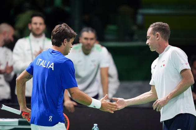 Flavio Cobolli with captain Filippo Volandri during the Davis Cup Finals 2025 Quarterfinals match between Flavio Cobolli (Italy) and Filip Misolic (Austria) at Bologna Fiere, Bologna, Italy - November 19, 2025. - Tennis.  Copyright: xMassimoxPaolone LaPressex