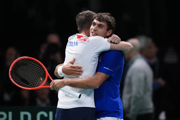 Flavio Cobolli celebrates for the victory with captain Filippo Volandri at the end of the Davis Cup Finals 2025 Quarterfinals match between Flavio Cobolli (Italy) and Filip Misolic (Austria) at Bologna Fiere, Bologna, Italy - November 19, 2025. - Tennis.  Copyright: xMassimoxPaolone LaPressex