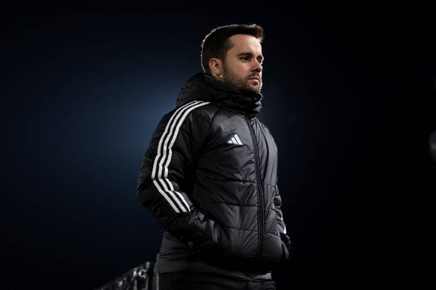 Biella, Italy, 19th November 2025. Jonatan Giraldez Head Coach of Lyon makes his way to the bench prior to kick off in the Juventus Women vs Lyonnes UEFA Womens Champions League match at Stadio Vittorio Pozzo, Biella. Picture credit should read: Jonathan Moscrop Sportimage EDITORIAL USE ONLY. No use with unauthorised audio, video, data, fixture lists, club league logos or live services. Online in-match use limited to 120 images, no video emulation. No use in betting, games or single club league player publications. SPI_104_JM_JUVE_LYONNES_UWCL SPI-4295-0104
