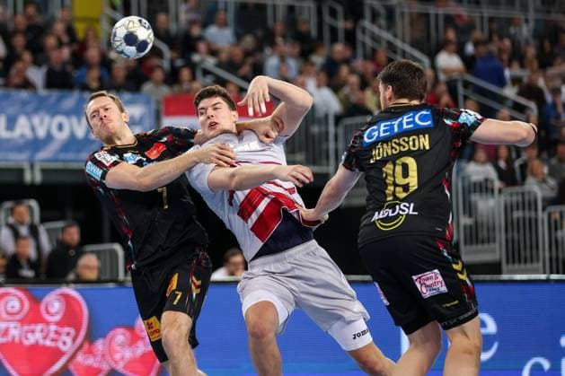 HC Zagreb v SC Magdeburg - EHF Champions League ZAGREB, CROATIA - NOVEMBER 19: Felix Claar of SC Magdeburg and Luka Lovre Klarica of HC Zagreb in action during the EHF Champions League match between HC Zagreb and SC Magdeburg at Arena Zagreb on November 19, 2025 in Zagreb, Croatia.  Igorxkralj PIXSELL