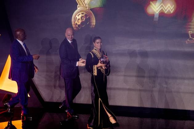 CAF Awards 2025 SALE, MOROCCO - NOVEMBER 19: Al-Hilal Saudi s Moroccan player Ghizlane Chebbak (R) receives the African Women s Footballer of the Year during the CAF Awards ceremony in Sale, Morocco on November 19, 2025. FIFA President Gianni Infantino (C) and Confederation of African Football (CAF) President Patrice Motsepe (L) attended the event. Abu Adem Muhammed Anadolu Sale Morocco. Editorial use only. Please get in touch for any other usage.  Copyright: x2025xAnadoluxAbuxAdemxMuhammedx