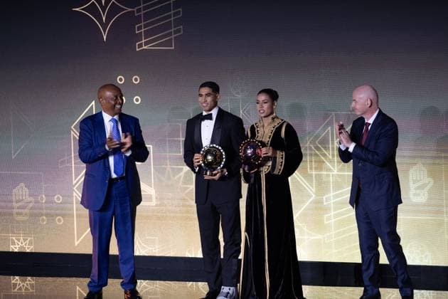 CAF Awards 2025 SALE, MOROCCO - NOVEMBER 19: Paris Saint-Germain’s Moroccan player Achraf Hakimi (2nd L) receives the African Footballer of the Year award and Al-Hilal Saudi s Moroccan player Ghizlane Chebbak (2nd R) receives the African Women s Footballer of the Year during the CAF Awards ceremony in Sale, Morocco on November 19, 2025. FIFA President Gianni Infantino (R) and Confederation of African Football (CAF) President Patrice Motsepe (L) attended the event. Abu Adem Muhammed Anadolu Sale Morocco. Editorial use only. Please get in touch for any other usage.  Copyright: x2025xAnadoluxAbuxAdemxMuhammedx