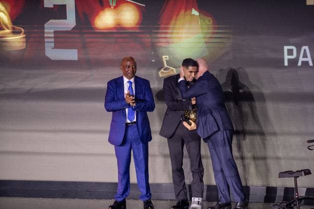 Achraf Hakimi wins African Footballer of the Year award SALE, MOROCCO - NOVEMBER 19: Paris Saint-Germain’s Moroccan player Achraf Hakimi (C) receives the African Footballer of the Year award during the CAF Awards ceremony in Sale, Morocco on November 19, 2025. FIFA President Gianni Infantino (R) and Confederation of African Football (CAF) President Patrice Motsepe (L) attended the event. Abu Adem Muhammed Anadolu Sale Morocco. Editorial use only. Please get in touch for any other usage.  Copyright: x2025xAnadoluxAbuxAdemxMuhammedx