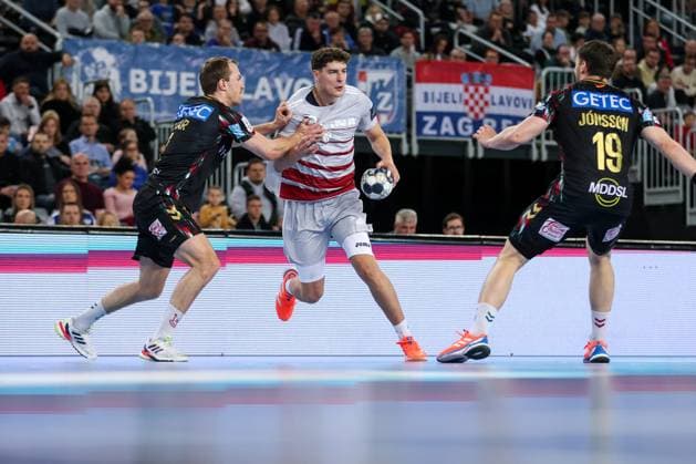 HC Zagreb v SC Magdeburg - EHF Champions League ZAGREB, CROATIA - NOVEMBER 19: Felix Claar of SC Madeburg and Luka Lovre Klarica of HC Zagreb during the EHF Champions League match between HC Zagreb and SC Magdeburg at Arena Zagreb on November 19, 2025 in Zagreb, Croatia.  Igorxkralj PIXSELL