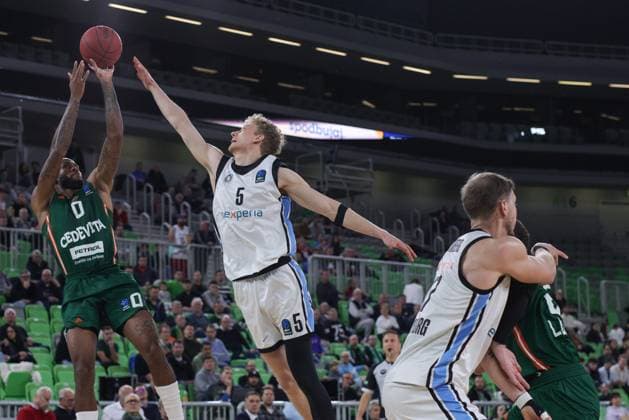 (251120) -- LJUBLJANA, Nov. 20, 2025 -- DJ Stewart (top L) of Cedevita Olimpija Ljubljana shoots during the BKT Eurocup 2025 26 match between Cedevita Olimpija Ljubljana and Veolia Towers Hamburg in Ljubljana, Slovenia, Nov. 19, 2025. (Photo by Xinhua) (SP)SLOVENIA-LJUBLJANA-BASKETBALL-BKT EUROCUP-CEDEVITA OLIMPIJA LJUBLJANA VS VEOLIA TOWERS HAMBURG ZeljkoxStevanic 