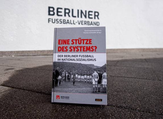 Soccer, season 2025 2026, book presentation A pillar of the system Berlin soccer under National Socialism, in the picture the book in front of the logo of the Berlin Football Association, 20 11 2025, Copyright: xMatthiasxKochx