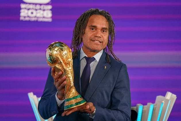 Soccer FIFA World Cup Qualification Europe 2025 26 Playoff Draw Home of FIFA Zurich, Switzerland Christian Karembeu FIFA Legend with World Cup Trophy, Cup Zurich Canton Zurich Switzerland Copyright: xJOERANxSTEINSIEKx