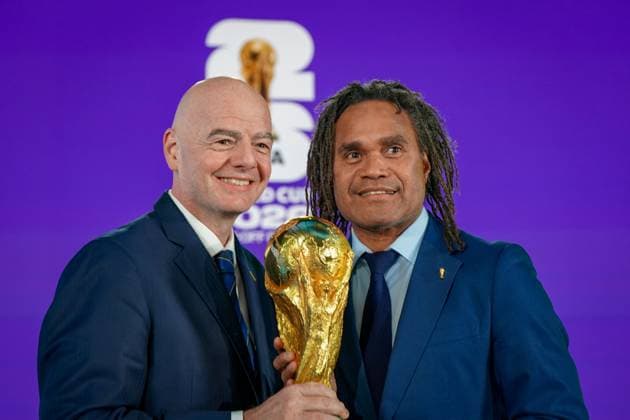 Soccer FIFA World Cup Qualification Europe 2025 26 Playoff Draw Home of FIFA Zurich, Switzerland Gianni Infantino FIFA President and Christian Karembeu FIFA Legend with World Cup trophy Zurich Canton Zurich Switzerland Copyright: xJOERANxSTEINSIEKx