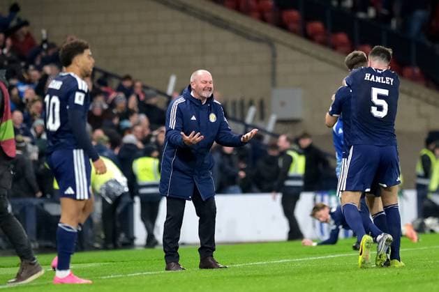 UK: Scotland v Denmark, UEFA World Cup European Qualifiers at Hampden Park, Glasgow, Scotland on 18 November 2025: Pictured: Kieran Tierney (Scotland) scores to make it 3-2 and Scotland Coach Steve Clarke shows his delight Glasgow Hampden Park Scotland Copyright: xAlexxToddx