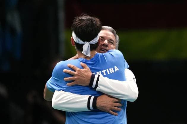 Tomas Martin Etcheverry celebrates for the victory with captain Javier Frana at the end of the Davis Cup Finals 2025 Quarterfinals match between Tomas Martin Etcheverry (Argentina) and Jan-Lennard Struff (Germany) at Bologna Fiere, Bologna, Italy - November 20, 2025. - Tennis.  Copyright: xMassimoxPaolone LaPressex
