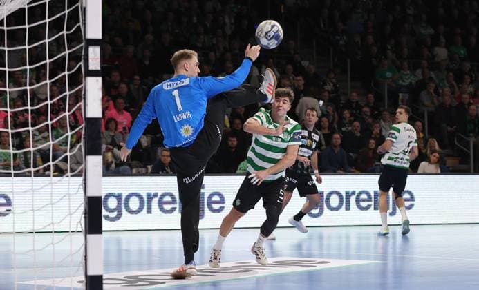 Goalkeeper Lasse Ludwig saves against Carlos Alvarez Dominguez duel Match scene Action Sport Handball CL Champions League Champions League Men 8 Matchday Season 2025 2026 20 11 2025 Füchse Berlin vs Sporting CP Lisbon LCP in the Max Schmeling Halle