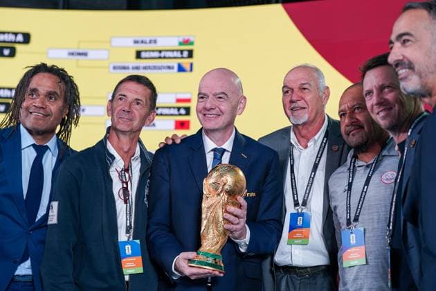 Soccer FIFA World Cup Qualification Europe 2025 26 Playoff Draw Home of FIFA Zurich, Switzerland Delegation New Caledonia with Gilles Tavergeux President New Caledonia Johann Sidaner National Coach and Gianni Infantino FIFA President and Christian Karembeu FIFA Legend with the original World Cup Trophy Zurich Canton Zurich Switzerland Copyright: xJOERANxSTEINSIEKx