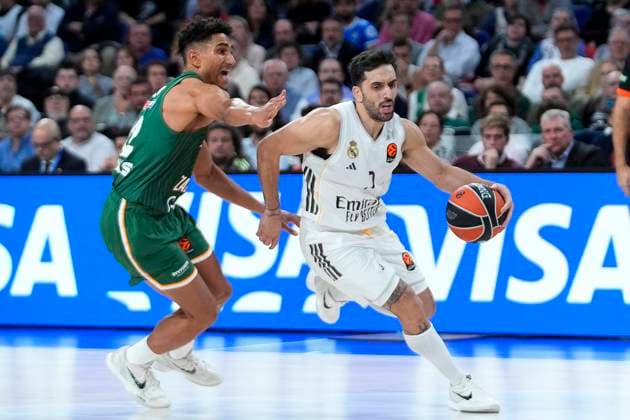 Real Madrid s Facundo Campazzo (r) and Zalgiris Kaunas Maodo Lo during Euroleague Regular Season Round 12 match. November 20, 2025. (20251120150)