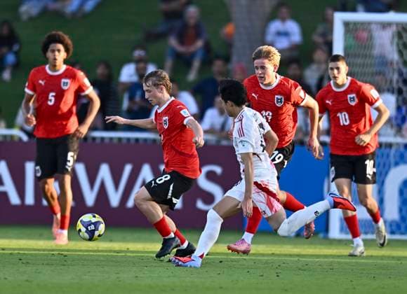 Austria v Japan : Quarter-final- FIFA U-17 World Cup Qatar 2025 Takeshi Wada of Japan and Jakob Oskar Werner of Austria in action during the FIFA U-17 World Cup Qatar 2025 Quarter-final match between Austria and Japan in Doha, Qatar, on November 21, 2025. DOHA Qatar Copyright: xNOUSHADxTHEKKAYILx