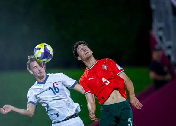 Football FIFA World Cup U17, U 17 World Cup Qatar 2025, Portugal vs Switzerland quarter-final Marco Correia Switzerland, 16 Jose Neto Portugal, 5 Copyright: xRedhaxHosnixSegganix