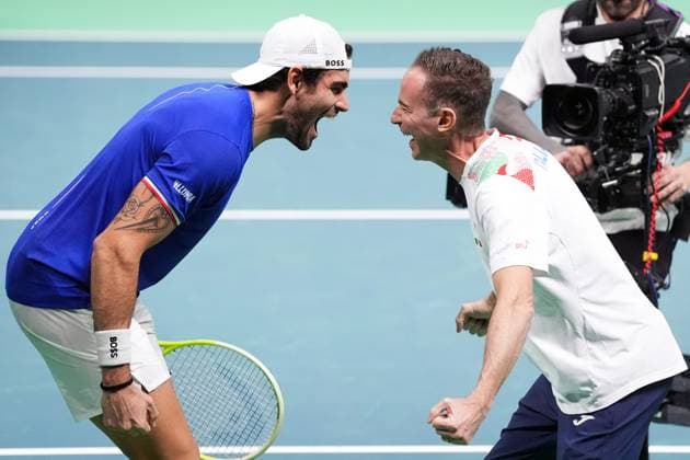 Matteo Berrettini celebrates for the victory with captain Filippo Volandri at the end of the Davis Cup Finals 2025 Semifinals match between Matteo Berrettini (Italy) and Raphael Collignon (Belgium) at Bologna Fiere, Bologna, Italy - November 21, 2025. - Tennis.  Copyright: xMassimoxPaolone LaPressex