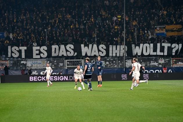 Fans Dynamo Dresden with banner Is that what you want during the 2 Bundesliga match between VfL Bochum and Dynamo Dresden, Vonovia Ruhrstadion on November 21, 2025 in Bochum, Germany Photo by Ralf Treese DeFodi Images Fans Dynamo Dresden with banner during the 2 Bundesliga match between VfL Bochum and Dynamo Dresden at Vonovia Ruhrstadion on November 21, 2025 in Bochum, Germany Photo by Ralf Treese DeFodi Images Photo by Ralf Treese DeFodi Images