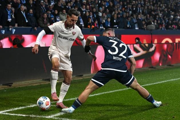 Konrad Faber Dynamo Dresden and Maximilian Wittek VfL Bochum battle for the ball during the 2 Bundesliga match between VfL Bochum and Dynamo Dresden, Vonovia Ruhrstadion on November 21, 2025 in Bochum, Germany Photo by Ralf Treese DeFodi Images Konrad Faber Dynamo Dresden and Maximilian Wittek VfL Bochum battle for the ball during the 2 Bundesliga match between VfL Bochum and Dynamo Dresden at Vonovia Ruhrstadion on November 21, 2025 in Bochum, Germany Photo by Ralf Treese DeFodi Images Photo by Ralf Treese DeFodi Images
