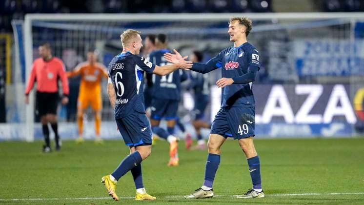 from left Valentin Lässig TSG II, 6 , Yannik Lührs TSG II, 49 , players of TSG 1899 Hoffenheim II U23 , cheer about the goal to 4 0, jubilation, goal celebration, celebrate the goal, goal, celebration, cheers about the goal, rejoicing, joy, rejoices, optimistic, positive, match scene, highlight, action, 21 11 2025, Sinsheim Germany , Football, 3 Liga, TSG 1899 Hoffenheim II MSV Duisburg, DFB DFL REGULATIONS PROHIBIT ANY USE OF PHOTOGRAPHS AS IMAGE SEQUENCES AND OR QUASI VIDEO xozx
