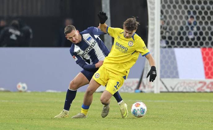 Paul Seguin, Max Marie duel Match scene Action Sport Soccer Football DFL 2 Bundesliga Men 13 Matchday Season 2025 2026 21 11 2025 Hertha BSC Berlin vs Eintracht Braunschweig BTSV DFL regulations prohibit any use of photographs as image sequences and or quasi video