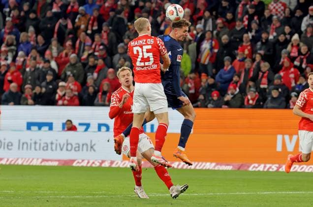 Mainz, Germany 21 November 2025 1 BL 2025 2026 FSV Mainz 05 vs TSG 1899 Hoffenheim In the picture Fisnik Asllani Hoffenheim 3 v li makes the goal to 0 1 DFL regulations prohibit any use of photographs as image sequences and or quasi video Mewa Arena Rheinland Pfalz Copyright: xFotostandx xRacochax