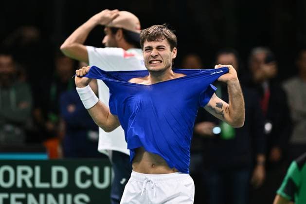 Flavio Cobolli of Italy celebrate the victori of the Davis Cup Semi-Final match between Flavio Cobolli of Italy and Zizou Bergs of Belgium at Supertennis Arena - Bolognafiere on November 21, 2025 in Bologna, Italy  Copyright: xDomenicoxCippitelli IPAxSportx xipa-agency.netx xx IPA_68222862 IPA_Agency_IPA68222862