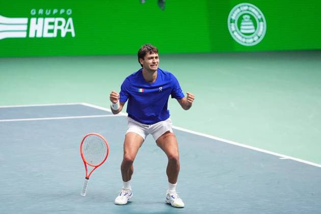 Flavio Cobolli celebrate for the victory at the end of the Davis Cup Finals 2025 Semifinals match between Flavio Cobolli (Italy) and Zizou Bergs (Belgium) at Bologna Fiere, Bologna, Italy - November 21, 2025. - Tennis.  Copyright: xMassimoxPaolone LaPressex