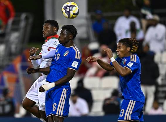 Italy v Burkina Faso : Quarter-final- FIFA U-17 World Cup Qatar 2025 Benit Borasio of Italy and Cherif Barro of Burkina Faso in action during the FIFA U-17 World Cup Qatar 2025 Quarter-final match between Italy and Burkina Faso in Doha, Qatar, on November 21, 2025. DOHA Qatar Copyright: xNOUSHADxTHEKKAYILx