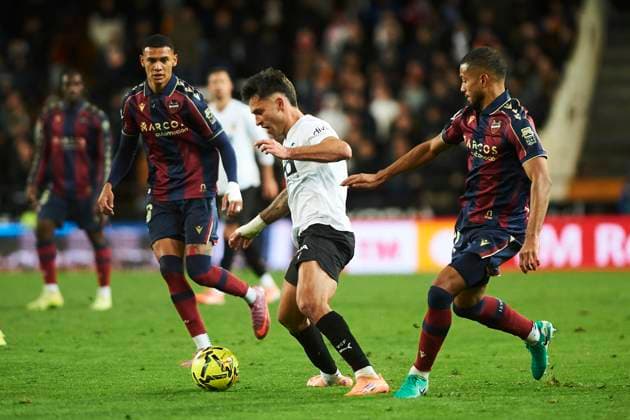 Hugo Duro Valencia CF and Jeremy Toljan Levante UD during the LaLiga EA Sports match between Valencia CF and Levante UD at Estadio de Mestalla on December 21, 2025 in Valencia, Spain Photo by Maria Jose Segovia DeFodi Images