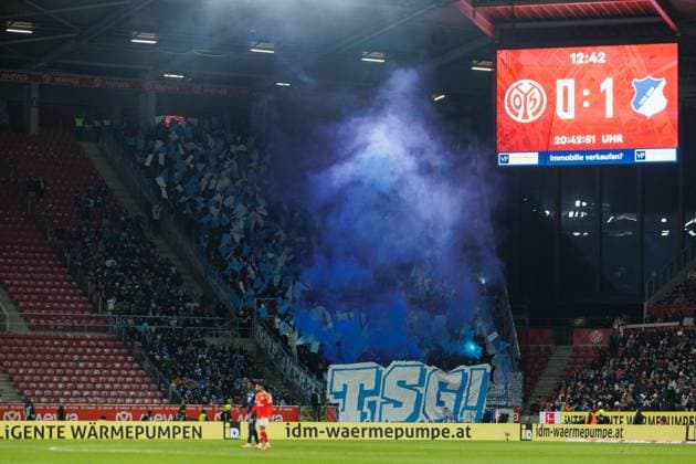 Fanblock Hoffenheim with Bengalos FSV Mainz 05 vs TSG Hoffenheim, Football, 1 Bundesliga, 11 Matchday, Season 2025 2026, 21 11 2025 DFB regulations prohibit any use of photographs as image sequences and or quasi video FSV Mainz 05 vs TSG Hoffenheim, Football, 1 Bundesliga, 11 Matchday, Season 2025 2026, 21 11 2025 Copyright: xEibner-Pressefoto AlexanderxNeisx EP_ANS