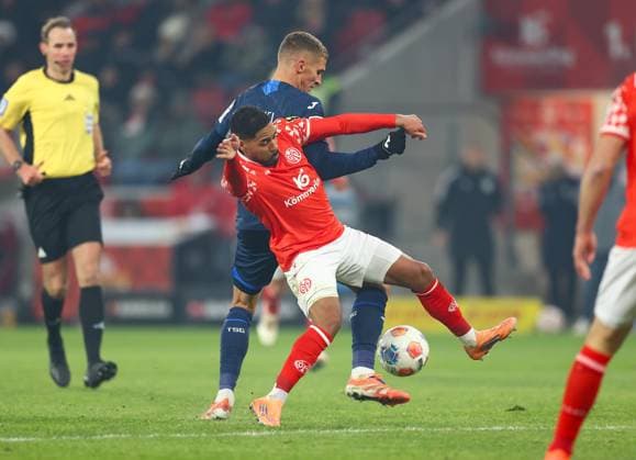 21 11 2025, Soccer Bundesliga, 1 FSV Mainz 05 TSG 1899 Hoffenheim, emonline, emspor, v l , Grischa Prömel TSG 1899 Hoffenheim , Phillipp Mwene FSV Mainz 05 DFL DFB REGULATIONS PROHIBIT ANY USE OF PHOTOGRAPHS AS IMAGE SEQUENCES AND OR QUASI VIDEO xdcx Copyright: HMBxMedia Claus
