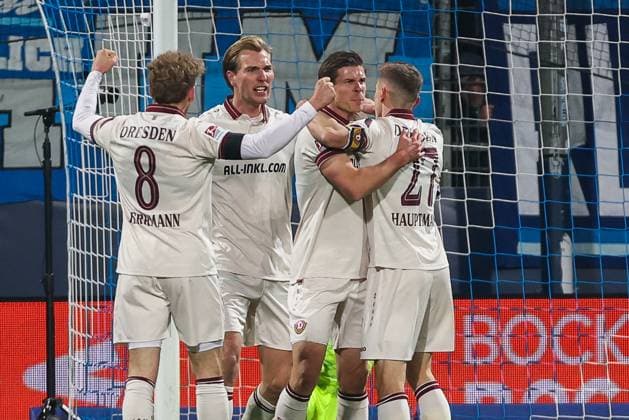 2 Bundesliga VfL Bochum SG Dynamo Dresden on 21 11 2025 at the Vonovia Ruhrstadion in Bochum Cheering, goal celebration, goal scorer, goal scorer Alexander Rossipal Dresden 19 cheers with the team after his goal to 0 to 1, here with Luca Herrmann Dresden 8 and Niklas Hauptmann Dresden 27 DFL regulations prohibit any use of photographs as image sequences and or quasi video MH