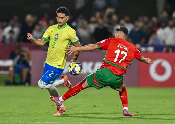 Morocco v Brazil : Quarter-final- FIFA U-17 World Cup Qatar 2025 Angelo (L) of Brazil and Moncef Zekri of Morocco in action during the FIFA U-17 World Cup Qatar 2025 Quarter-final match between Morocco and Brazil in Doha, Qatar, on November 21, 2025. DOHA Qatar Copyright: xNOUSHADxTHEKKAYILx