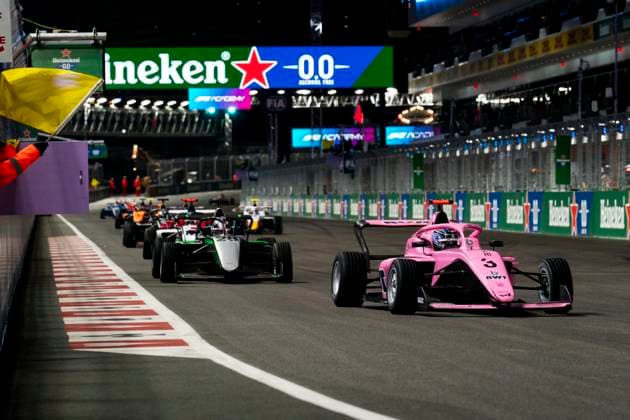 Dutch Formula One Academy driver Nina Gateman of Prema Racing leads the pack under a safety car during race one of the Formula One Academy series at the Formula One Las Vegas Grand Prix at the Las Vegas Strip Circuit in Las Vegas on 21, November 2025.  LAS2025112134 GREGxNASH