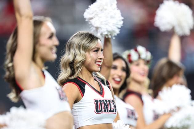 November 21, 2025: A UNLV Rebels cheerleader performs prior to the start of the college football game featuring the Hawaii Rainbow Warriors and the UNLV Rebels at Allegiant Stadium in Las Vegas, NV. CSM. Las Vegas United States of America - ZUMAc04_ 20251121_zma_c04_441 Copyright: xChristopherxTrimx