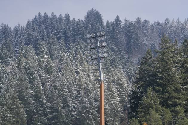 Floodlight mast with snow in the background, Black Forest, Trees, Winter , Germany, Soccer, GooglePixel Womens Bundesliga, 11 Matchday, 2025 2026, SC Freiburg vs FC Carl Zeiss Jena, 22 11 2025, Dreisamstadion, Freiburg, Germany DFB REGULATIONS PROHIBIT ANY USE OF PHOTOGRAPHS AS IMAGE SEQUENCES AND OR QUASI VIDEO Freiburg Dreisamstadion Baden Wuerttemberg Germany Copyright: xArnexAmbergx