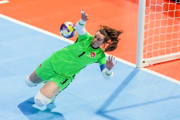 (251122) -- PASIG CITY, Nov. 22, 2025 -- Goalkeeper Lea Palacio-Tellier of Canada makes a save during the match between Colombia and Canada at the FIFA Futsal Women s World Cup 2025 in Pasig City, the Philippines, Nov. 22, 2025. ) (SP)PHILIPPINES-PASIG CITY-FUTSAL-WOMEN S WORLD CUP 2025-COLOMBIA VS CANADA RouellexUmali 
