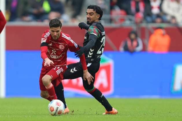 Anouar El Azzouzi Fortuna Duesseldorf and Rayan Ghrieb 1 FC Magdeburg in a duel during the 2 Bundesliga match between Fortuna Duesseldorf and 1 FC Magdeburg, Merkur Spiel Arena on November 22, 2025 in Duesseldorf, Germany Photo by Oliver Kaelke DeFodi Images Anouar El Azzouzi Fortuna Duesseldorf and Rayan Ghrieb 1 FC Magdeburg battle for the ball during the 2 Bundesliga match between Fortuna Düsseldorf and 1 FC Magdeburg at Merkur Spiel Arena on November 22, 2025 in Düsseldorf, Germany Photo by Oliver Kaelke DeFodi Images Photo by Oliver Kaelke DeFodi Images