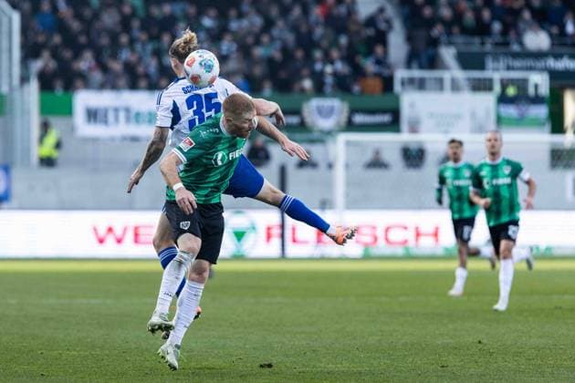 2 Soccer Bundesliga SC Preußen Münster FC Schalke 04 22 11 2025 Nikola Katic FC Schalke 04, 25 , Mikkel kirkeskov SC Preußen Münster, 2 2 Soccer Bundesliga 13 Matchday SC Preußen Münster FC Schalke 04 LVM Preußenstadion, Münster 22 11 2025 DFL regulations prohibit any use of photographs as image sequences and or quasi video Copyright: xBEAUTIFULxSPORTS Buriakovx