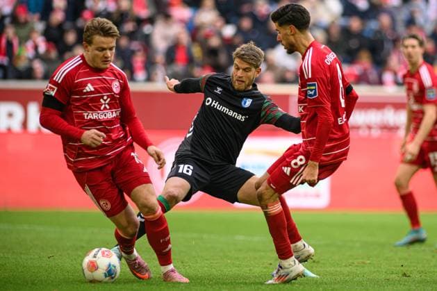 DUSSELDORF, GERMANY - 22 NOVEMBER, 2025: Marcus Mathisen, Christian Rasmussen, Anouar El Azzouzi - Football match Bundesliga 2 Fortuna Duesseldorf - 1. FC Magdeburg at Merkur Spiel Arena.  Copyright: xVITALIIxKLIUIEVx