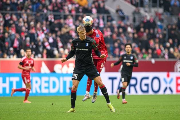 DUSSELDORF, GERMANY - 22 NOVEMBER, 2025: Luka Hyrylainen, Anouar El Azzouzi - Football match Bundesliga 2 Fortuna Duesseldorf - 1. FC Magdeburg at Merkur Spiel Arena.  Copyright: xVITALIIxKLIUIEVx