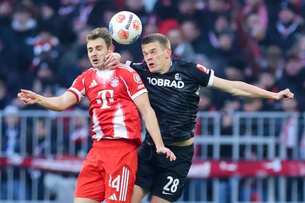 Josip Stanisic FC Bayern Muenchen and Matthias Ginter SC Freiburg battle for the ball, Bundesliga, FC Bayern München v Sport Club Freiburg, Allianz Arena on November 22, 2025 in Munich, Germany Photo by Marco Steinbrenner DeFodi Images Josip Stanisic FC Bayern Muenchen and Matthias Ginter SC Freiburg battle for the ball, Bundesliga, FC Bayern München v Sport Club Freiburg, Allianz Arena, November 22, 2025 in Munich, Germany Photo by Marco Steinbrenner DeFodi Images DFL regulations prohibit any use of photographs as image sequences and or quasi video